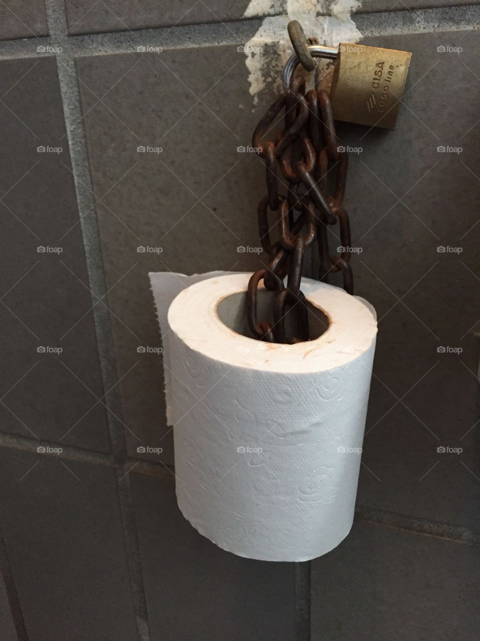 Toilet paper chained. Toilet paper chained