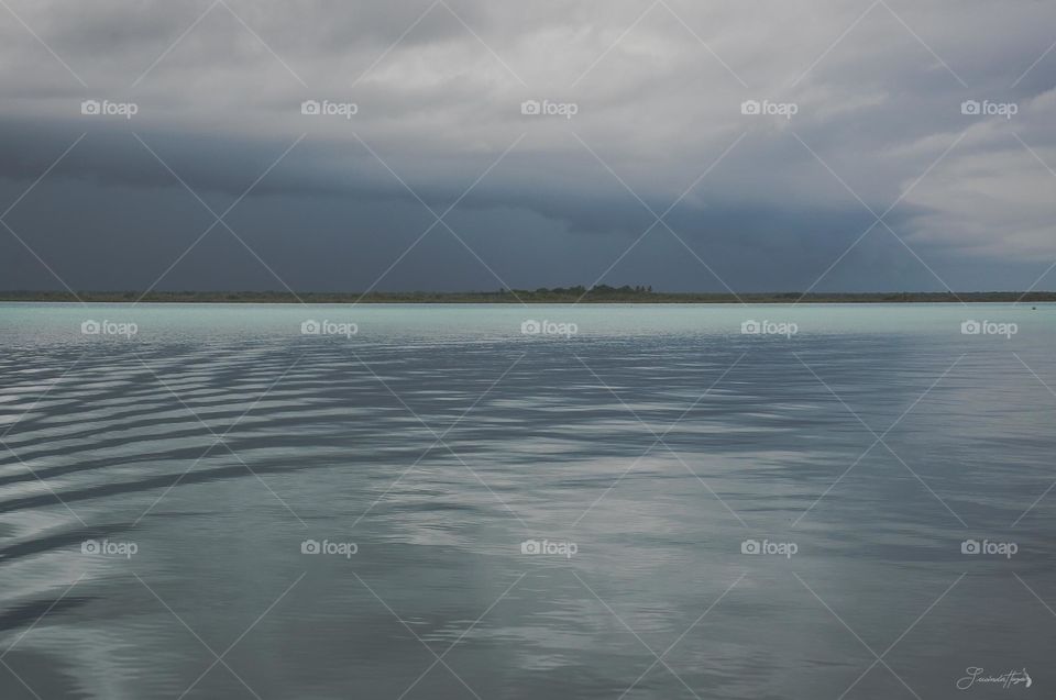 "Bacalar -surrounded by reeds" is considered a magic town since 2006. It Is well known as the lagoon of the seven colors and is the second largest lagoon in Mexico. It was truly an amazing place to visit and yet again had the perfect dramatic day for pictures. Hope you like it!