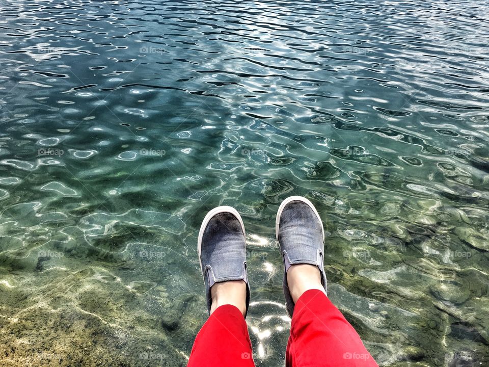 Feet and lake 