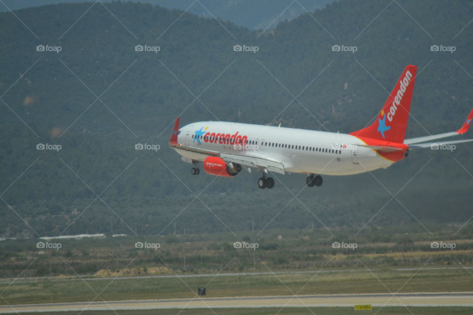 airplane landing on airport.