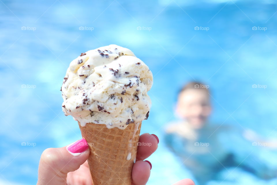 Woman holding chocolate chip ice cream