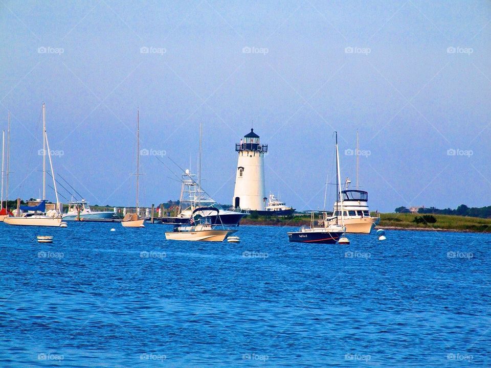 Lighthouse and boats