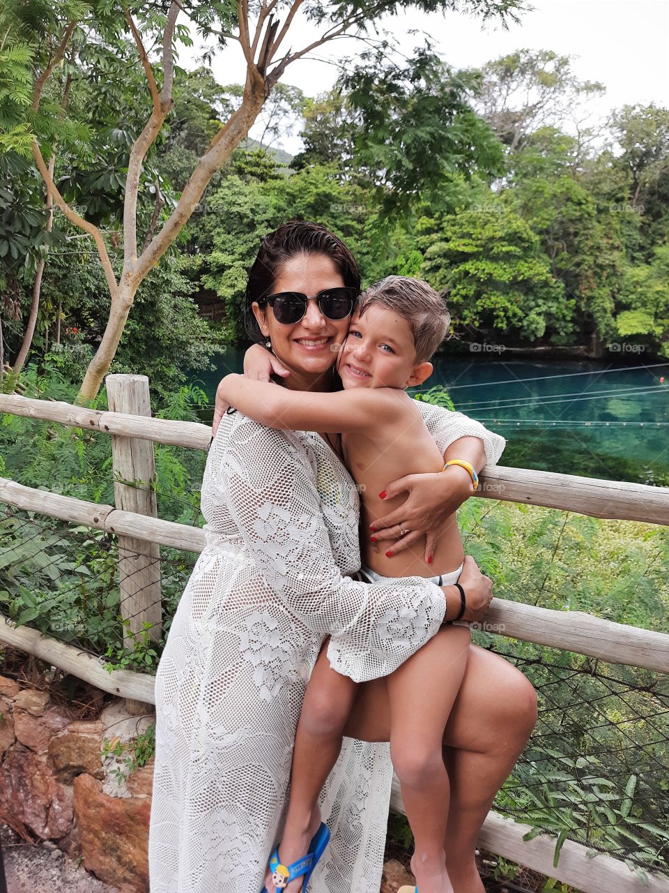 mother and son hugging and smiling