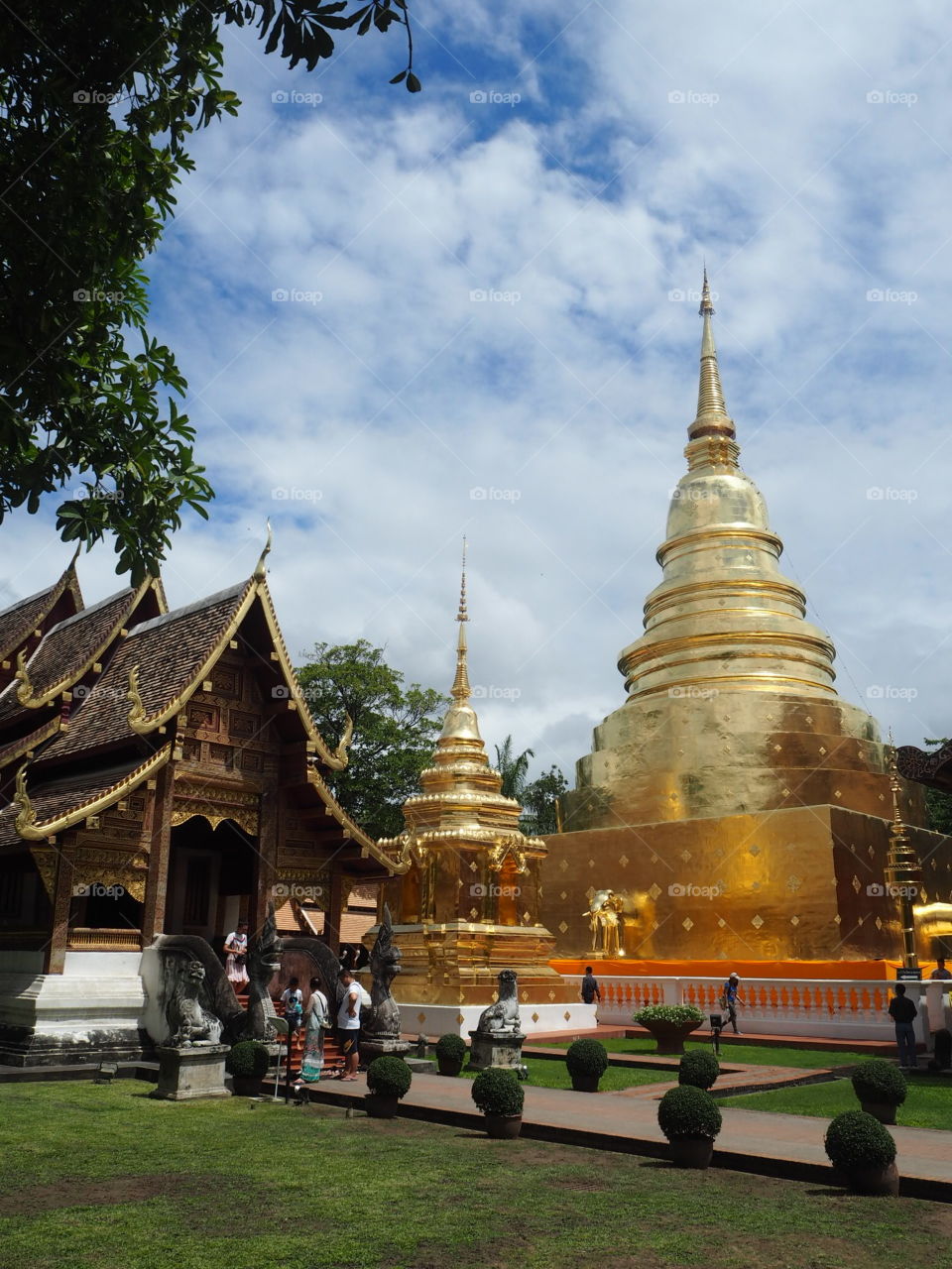 We're call that big building is  pagoda or stupa .In thailand language we're call that thing is chedi .  

                                                                                       P.S.
( If i use a word or gramma and sentences wrong  you can tell me or teach me  how to use it for right .  thank you . )

                                                            Sawasdeekrab