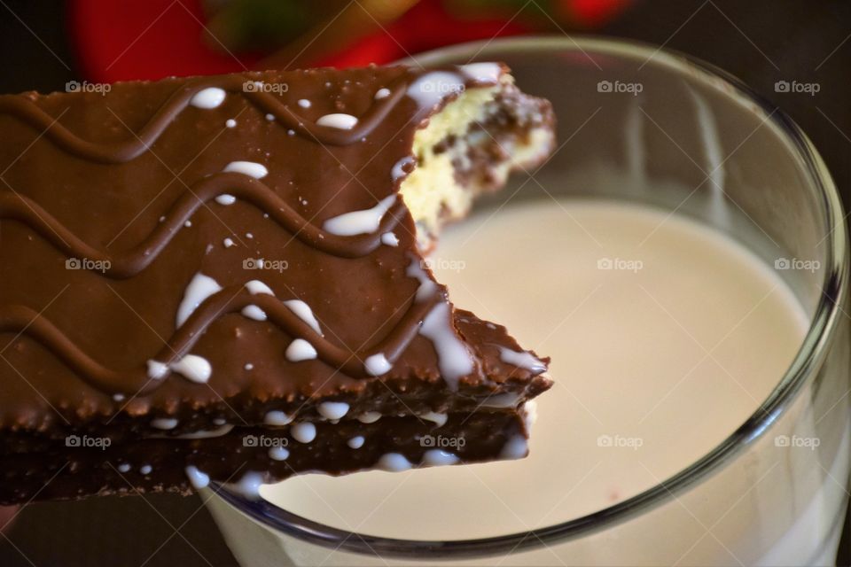 Chocolate cake with bite and milk drops
