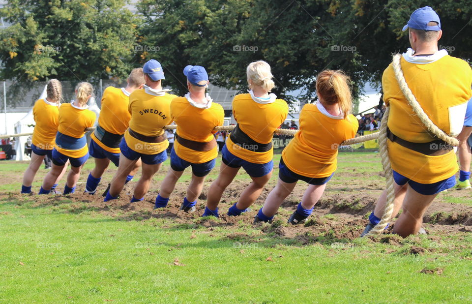 Teamwork - tug of war.