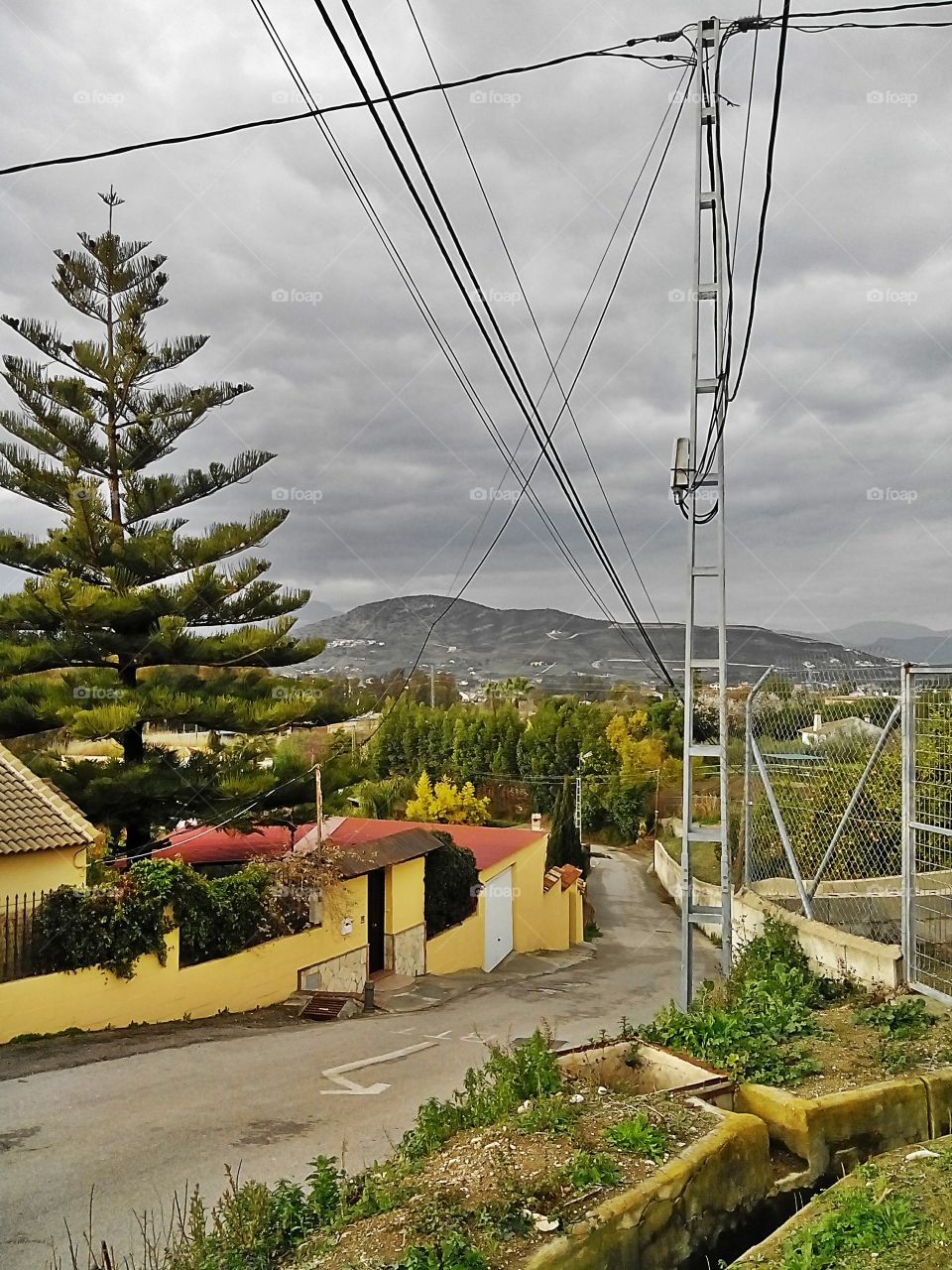 Electric poles and wire in Alhaurin el Grande, spain