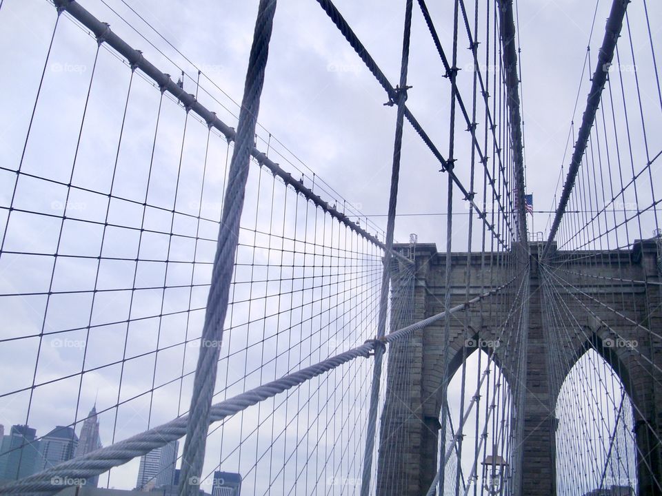 Waking across the Brooklyn Bridge - Perspective vanishing point view created with cables