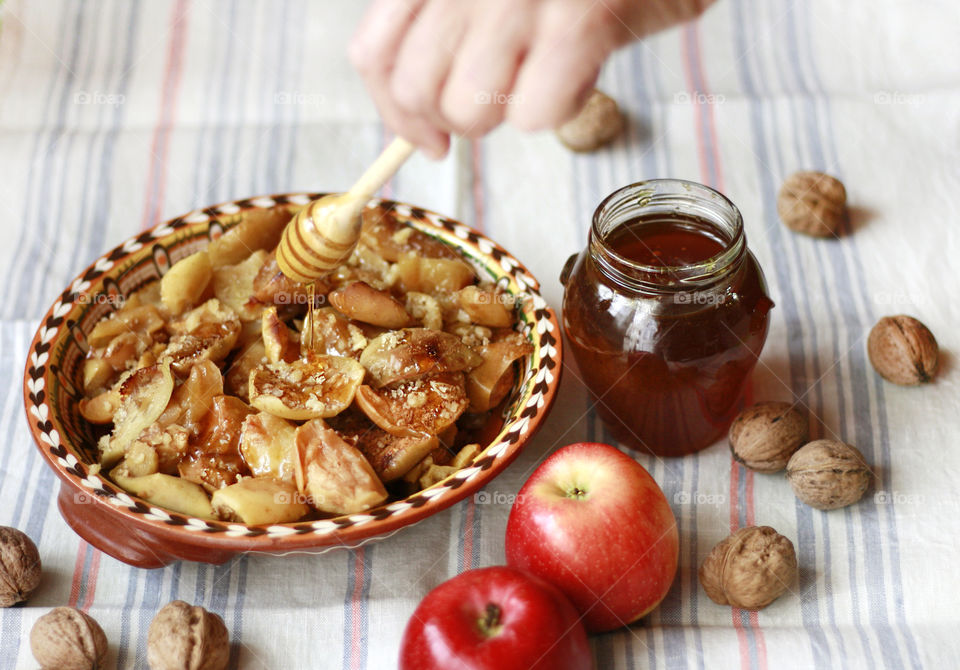 Baked apples, walnuts and honey, cozy time at home