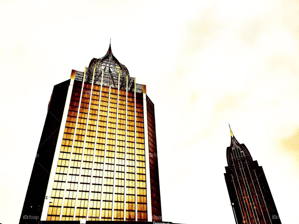 sunlight reflecting off the side of a skyscraper in Mobile, Alabama