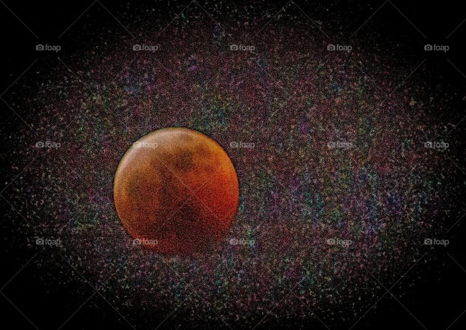 Solar Eclipse w/ several stars in the background.