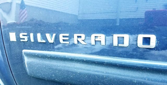 SILVERADO LOGO on blue truck