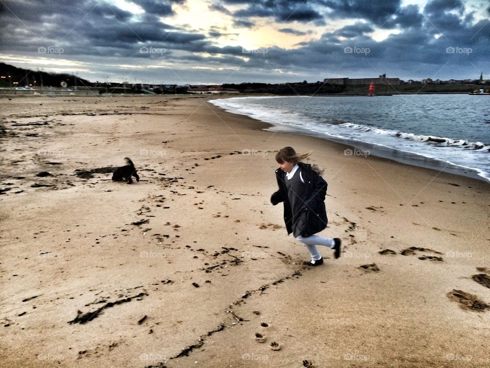 Girl running on beach