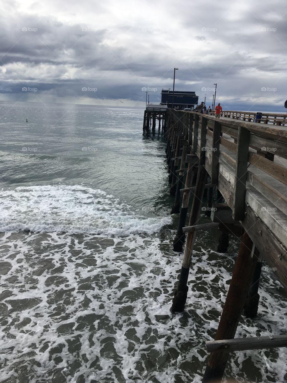 pier and storm 
newport beach CA USA
