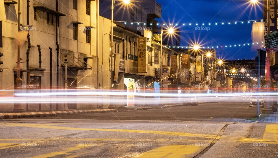 Car head lamp lighting in the early morning