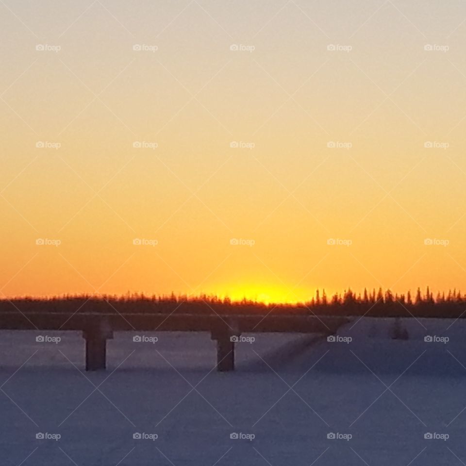 Sunset on railroad bridge