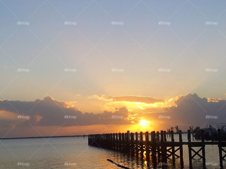 Sunrise on the dock at Sebastian Inlet