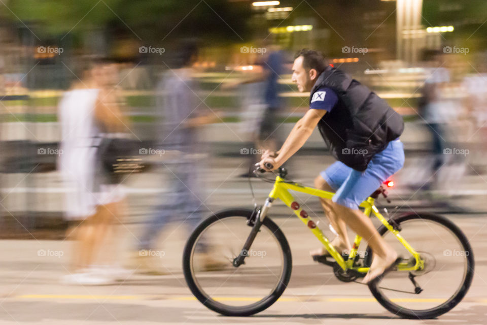 Young Man On Bike Ride In The City