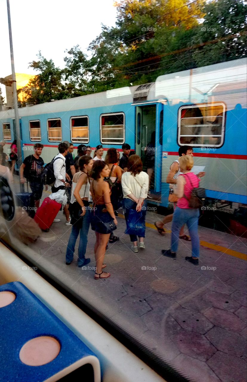 People getting on the train.  View from my train window.