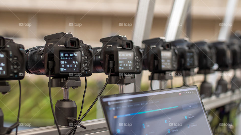 Array of digital cameras in a studio