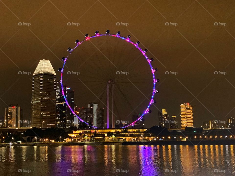 Singapore Flyer with purple light at night 