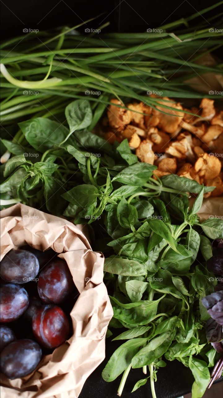 photos of bright natural colors of products, namely chanterelle mushrooms, fruits and natural greenery