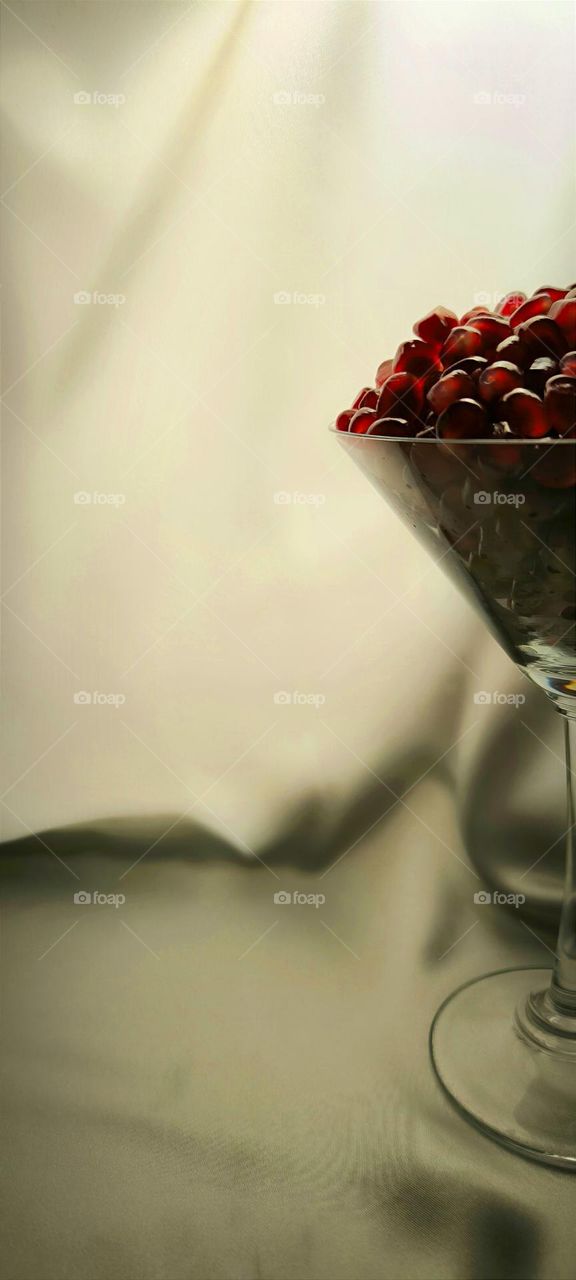Glass with pomegranate