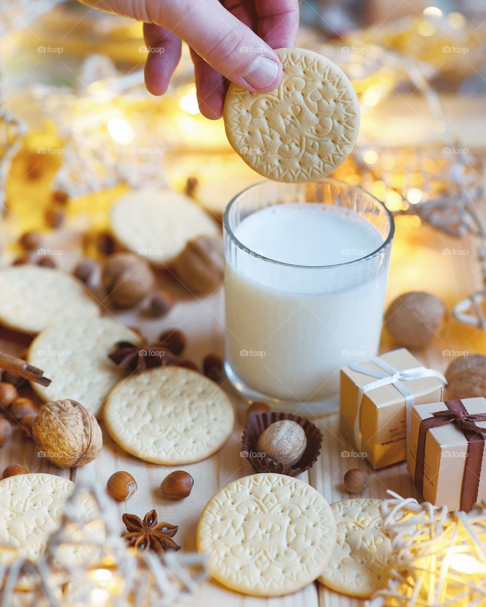 Person's hand holding biscuit