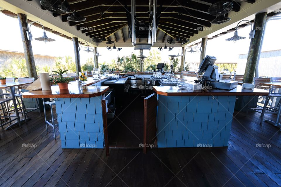 Bar table and wine glass inside the restaurant with no people