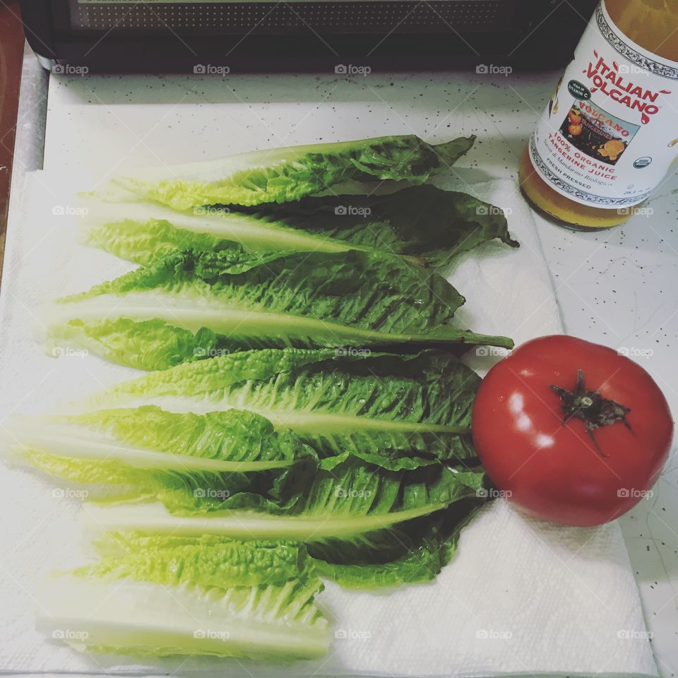 Salad with a side of juice 