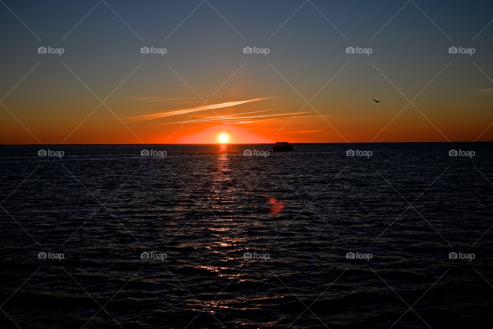 sunset crossing the Atlantic Ocean