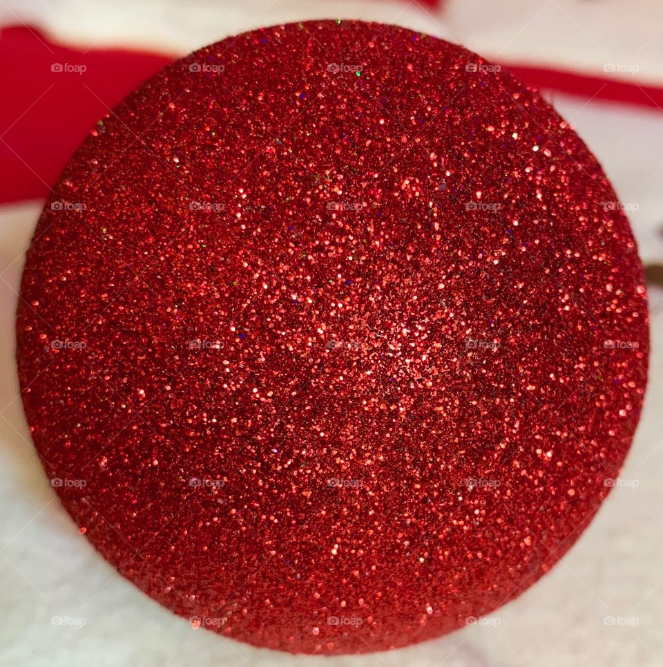 Red glittery ball ornament
