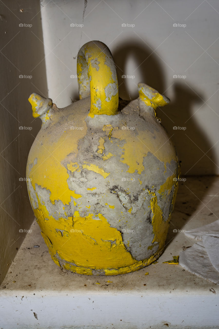 Traditional water pitcher yellow painted.