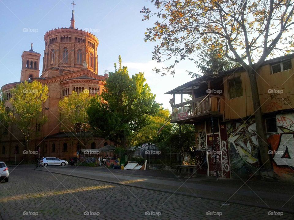 St. Thomas church and nearby treehouse  in Kreuzberg  Berlin