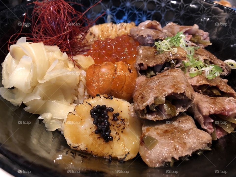 Seafood and beef donburi