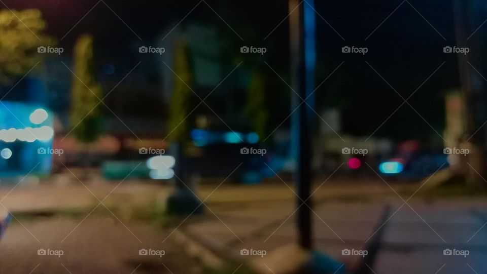 Defocused abstract background of city
street at night with street lamp lighting.
Blurred cityscape,Lighting
night at tourist attraction colorful.