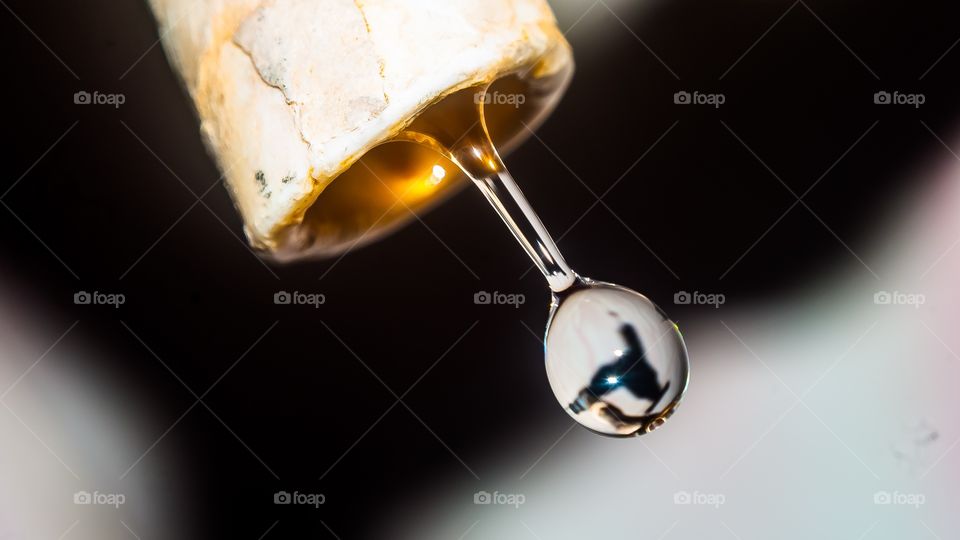 Close-up of faucet with water drop