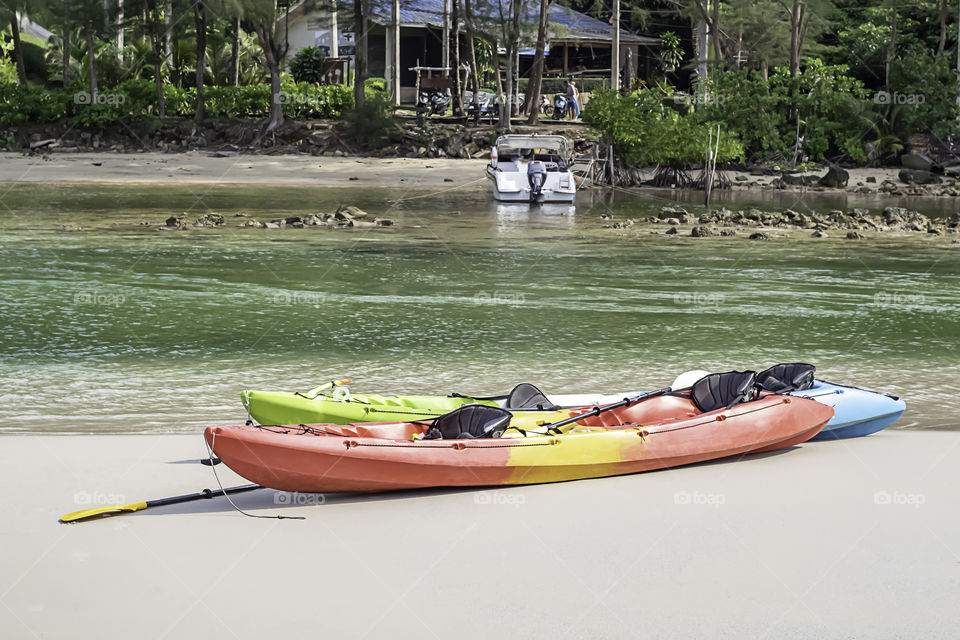 Kayaking on the sand of the sea.