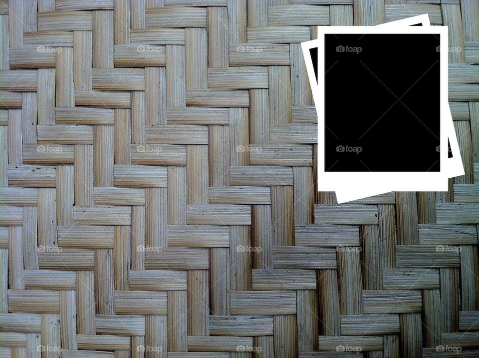 Photo frame on basketwork background