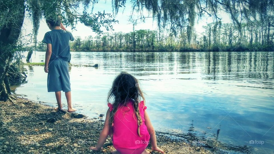 hunting shells on the river bank