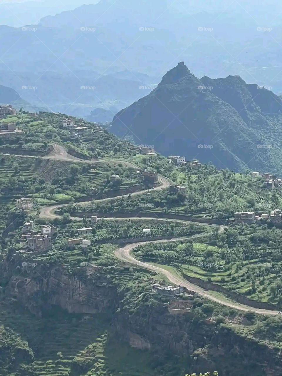 Glory be to God, the magnificent and picturesque view and the natural green trees are a view that is nothing more wonderful than it