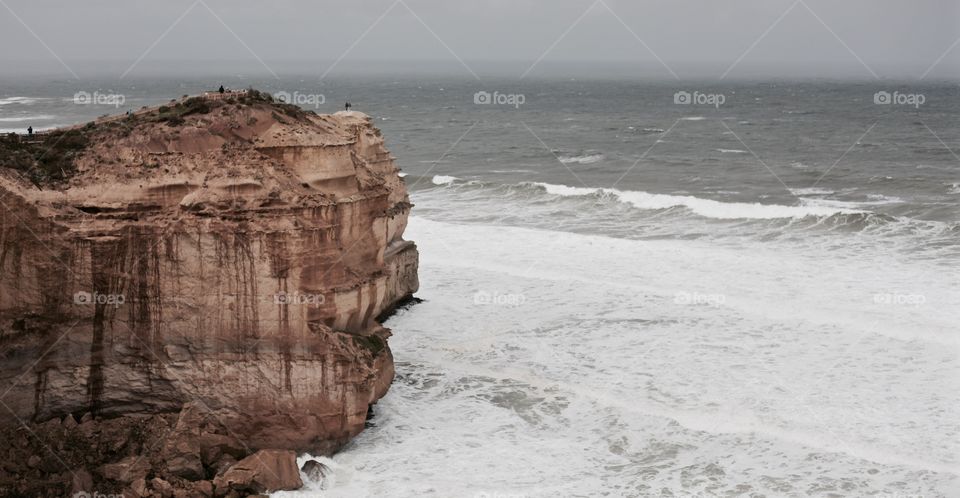 Cliff reaching into the ocean - 12 Apostles Australia 