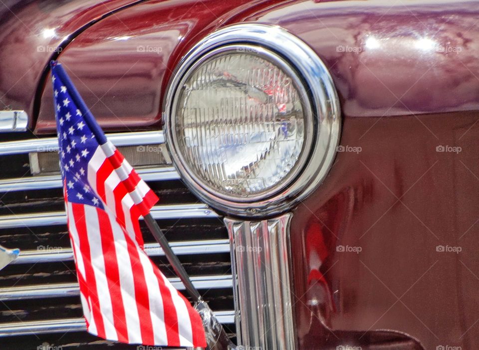 Detroit Steel. Vintage American Car With Stars And Stripes Flag
