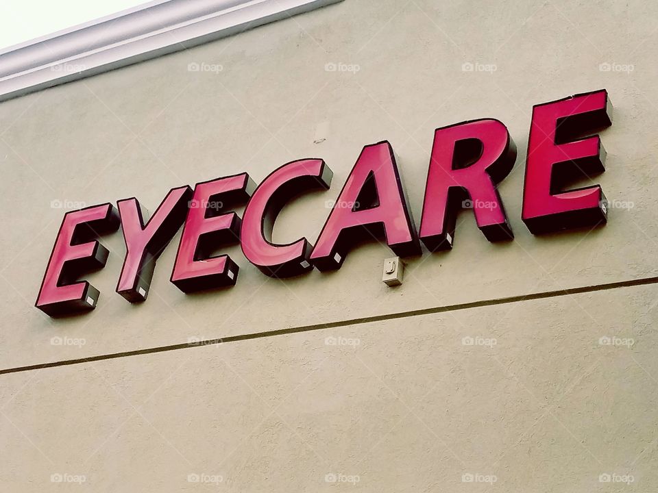 Eyecare Sign on Building