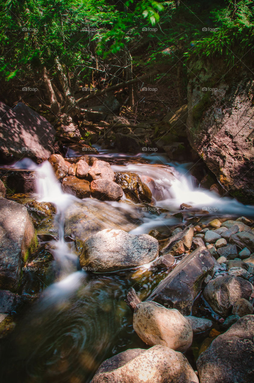 Stream flowing through rocks