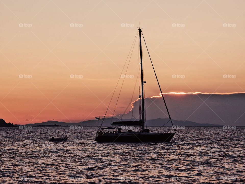 Sunset With A Boat Silhouette, Greek Sunset, Sunset In Greece, Reflections On The Water