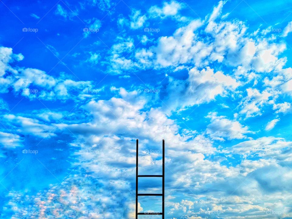 surreal ladder to climb into the sky