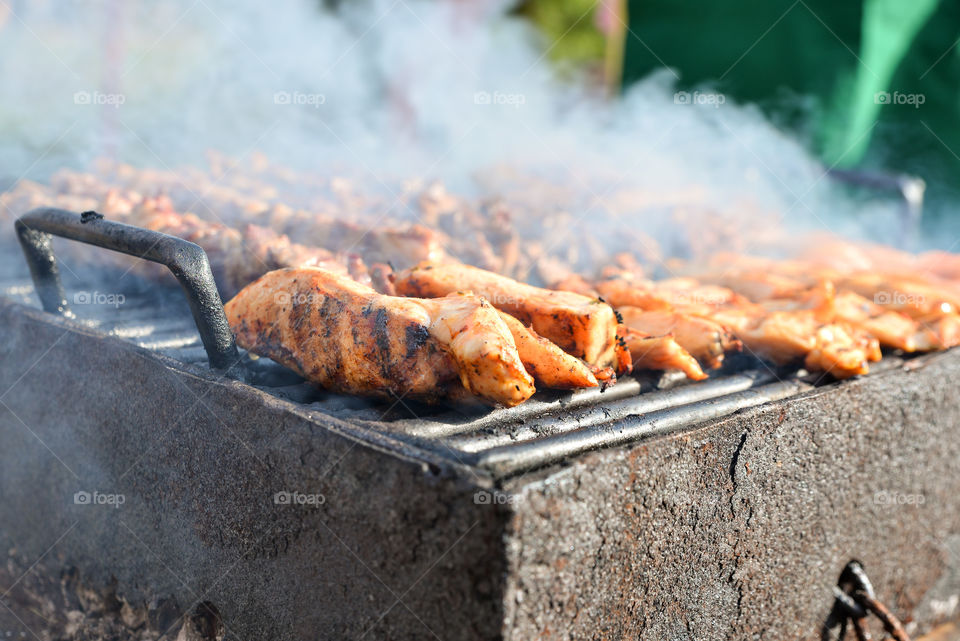 Meat on barbecue grill