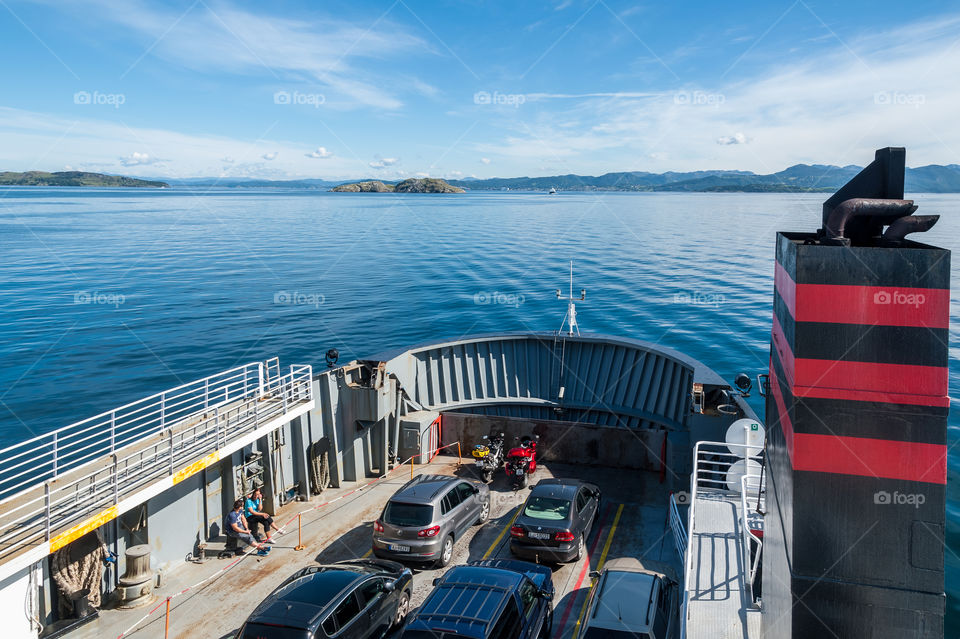 Ferry crossing on fjord.