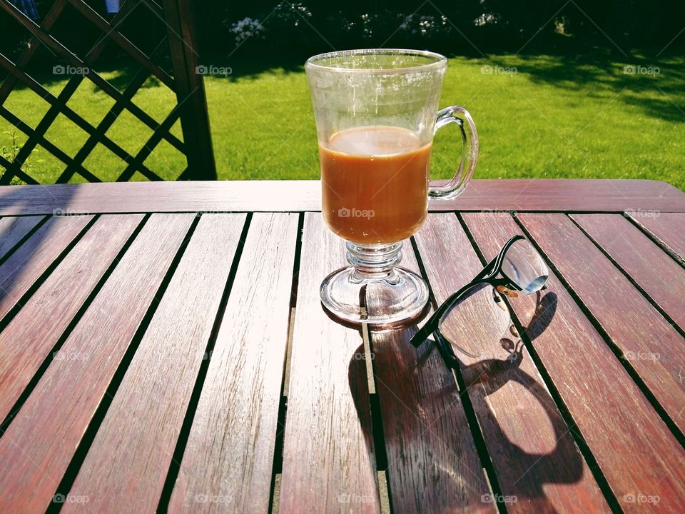 coffee in the morning sun in garden